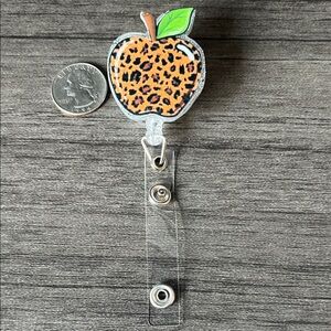 Leopard Apple badge reel
